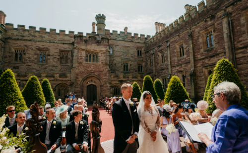 Wedding couple getting married in a courtyard, ceremony