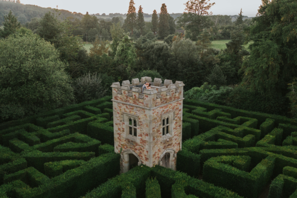 Couple stand at top of Gothic Tower