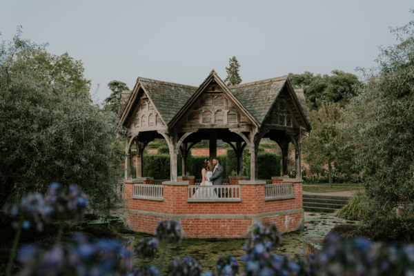 Bride and groom stood in Pavilion