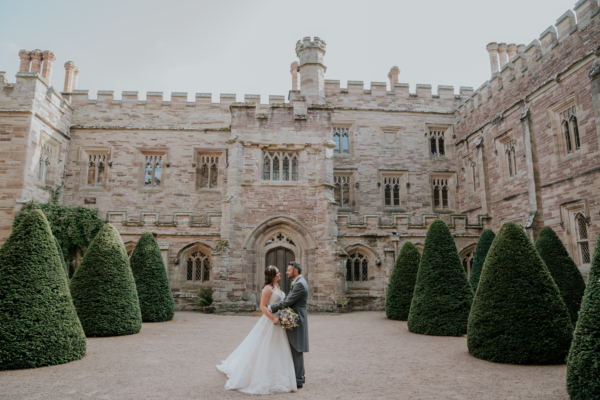 Bride and groom look at each other in Centre Courtyard