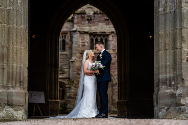 Wedding couple facing each other in drawthrough