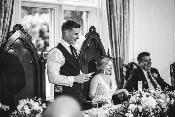 Groom giving speech at wedding breakfast