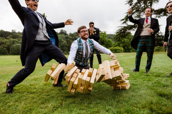 Group of guests playing Jenga