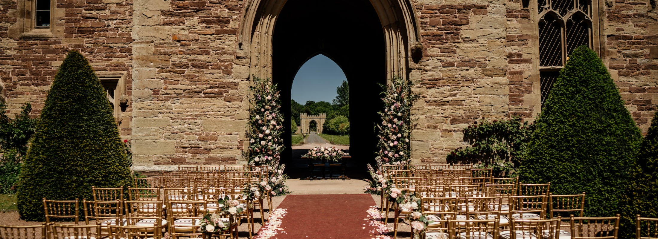 Wedding ceremony set up at Central Courtyard at Hampton Castle