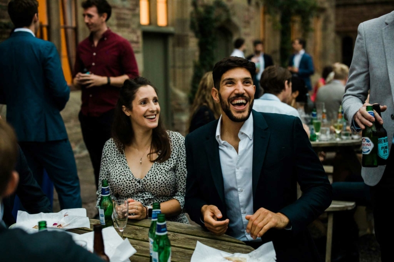 Guests enjoying themselves outside in the Arkwright Courtyard in the summer
